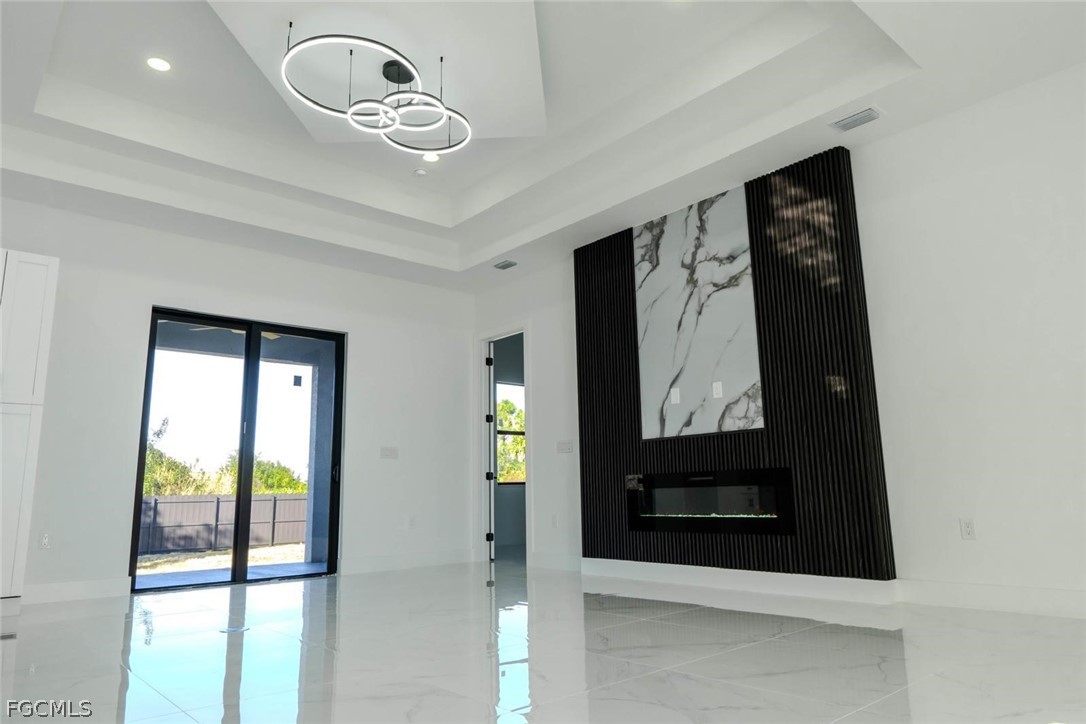 3206 14th Street Southwest Lehigh Acres, FL 33976 - Photo 13 of 38 a view of front door with hallway