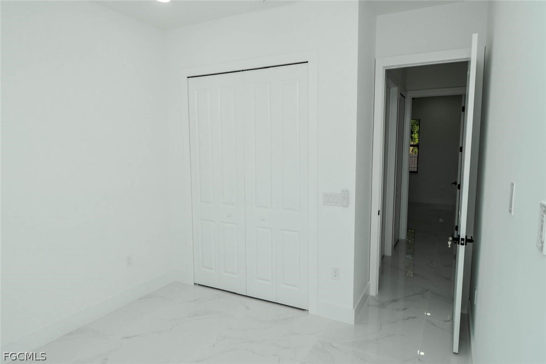 3206 14th Street Southwest Lehigh Acres, FL 33976 - Photo 15 of 38 a view of an empty room