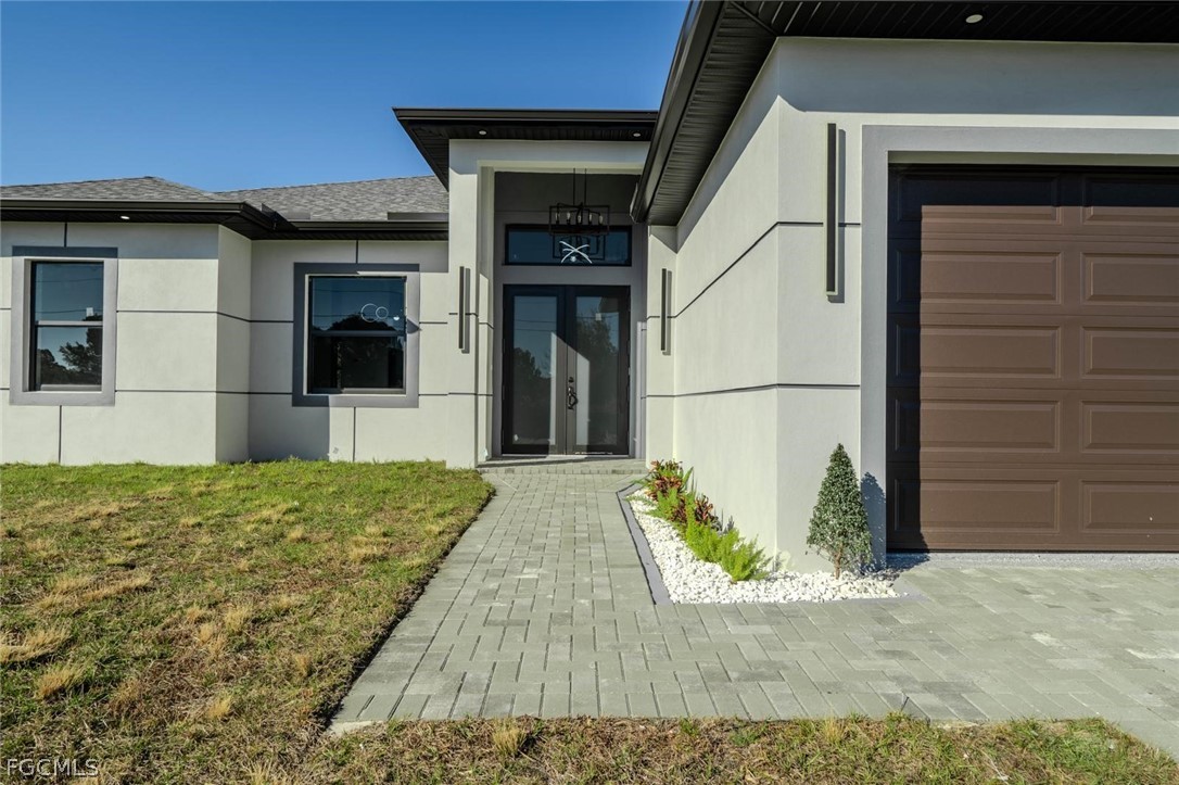 3206 14th Street Southwest Lehigh Acres, FL 33976 - Photo 3 of 38 a view of a house with a outdoor space