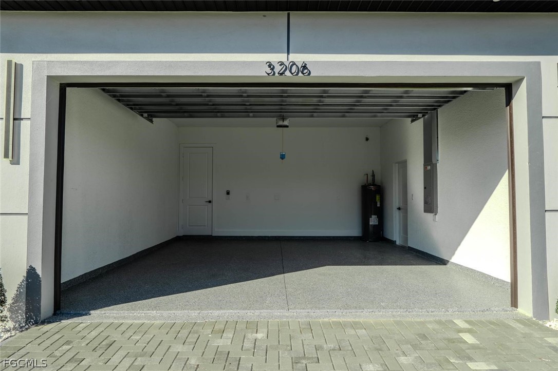 3206 14th Street Southwest Lehigh Acres, FL 33976 - Photo 4 of 38 a view of a garage