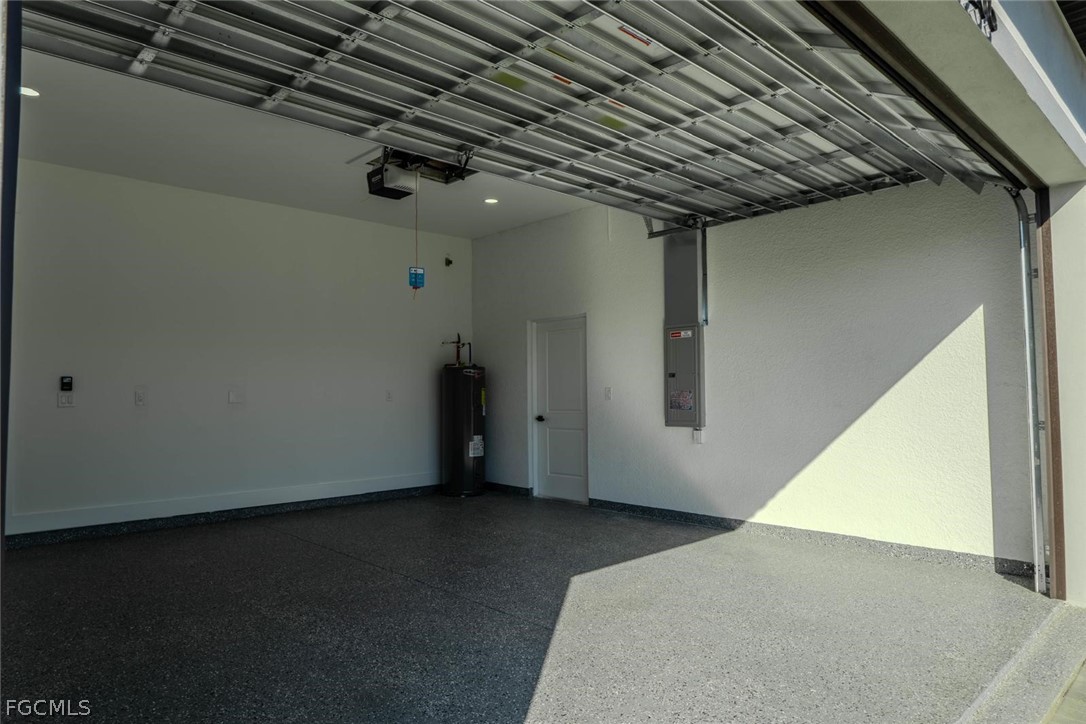 3206 14th Street Southwest Lehigh Acres, FL 33976 - Photo 5 of 38 a view of a big room with wooden floor