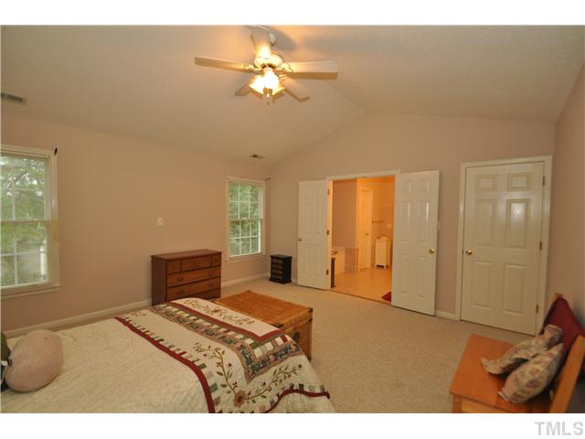 9008 Breeland Way Raleigh, NC 27613 - Photo 12 of 18 Spacious room with cathedral ceiling and adjacent private bath
