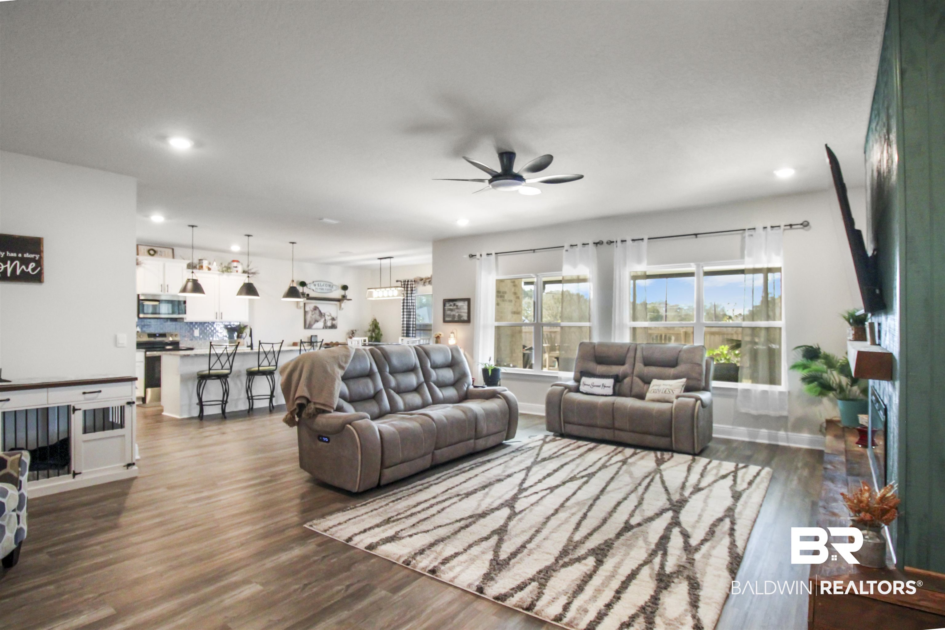 12523 Pheasant Run Elberta, AL 36530 - Photo 13 of 43 Living area featuring a ceiling fan, dark wood-style flooring, and recessed lighting