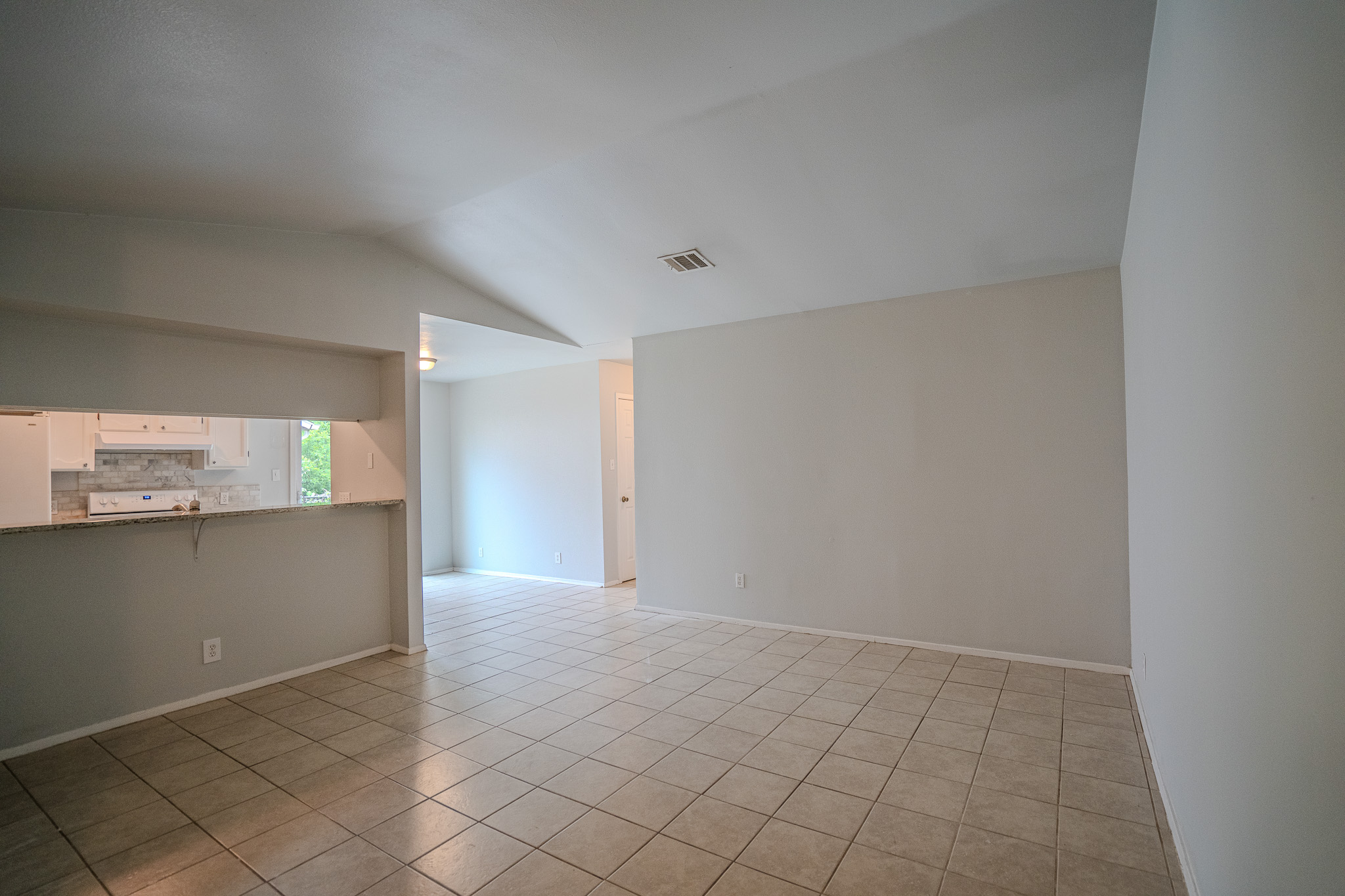 12403 Tree Line Drive, Unit B Austin, TX 78729 - Photo 4 of 16 a view of an empty room