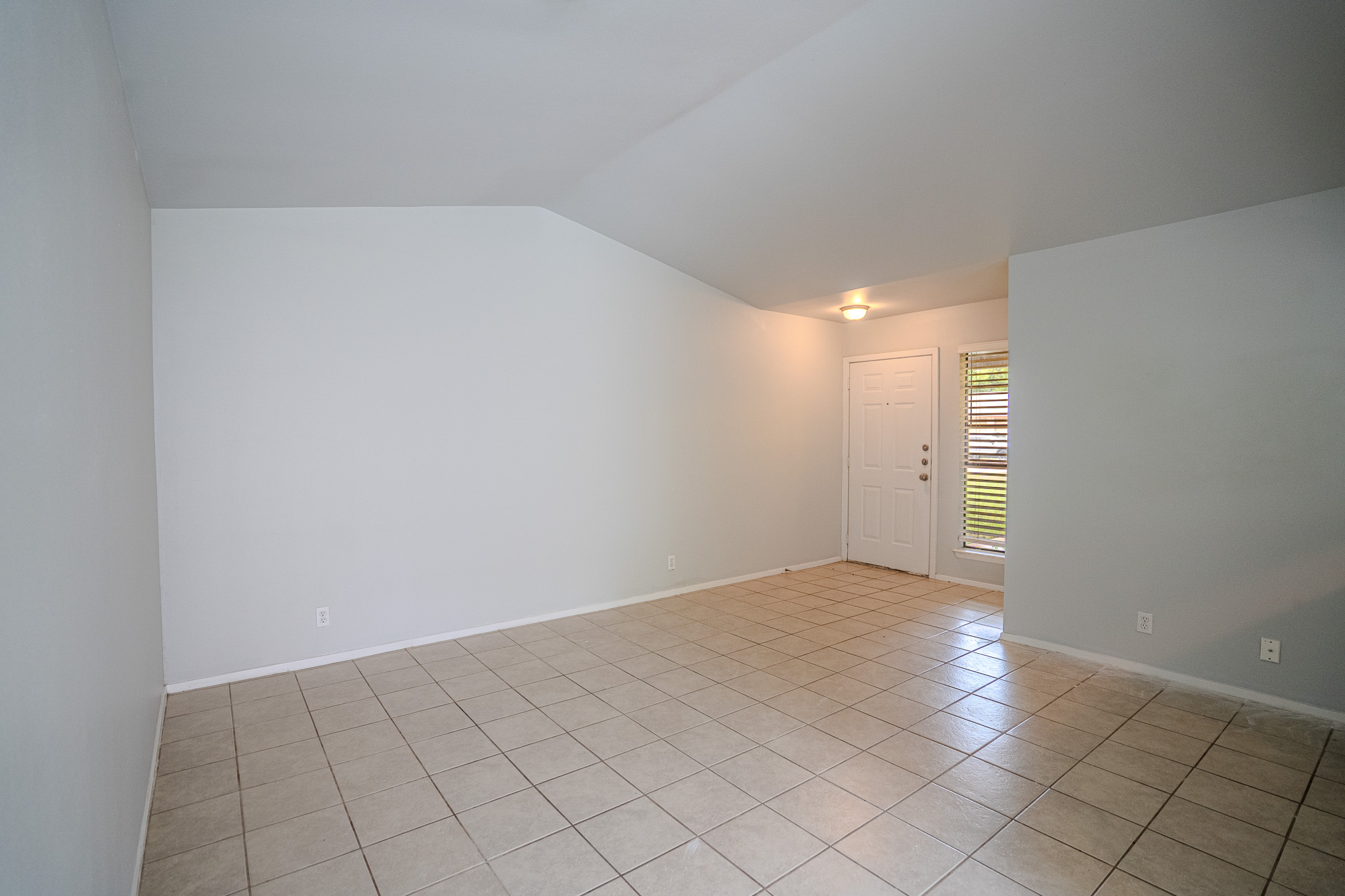 12403 Tree Line Drive, Unit B Austin, TX 78729 - Photo 6 of 16 a view of an empty room