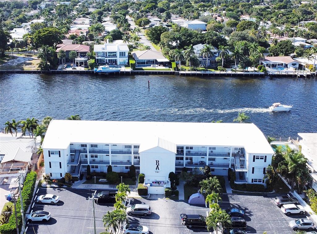 701 South Riverside Drive, Unit 107 Pompano Beach, FL 33062 - Photo 2 of 27 an aerial view of a house with a lake