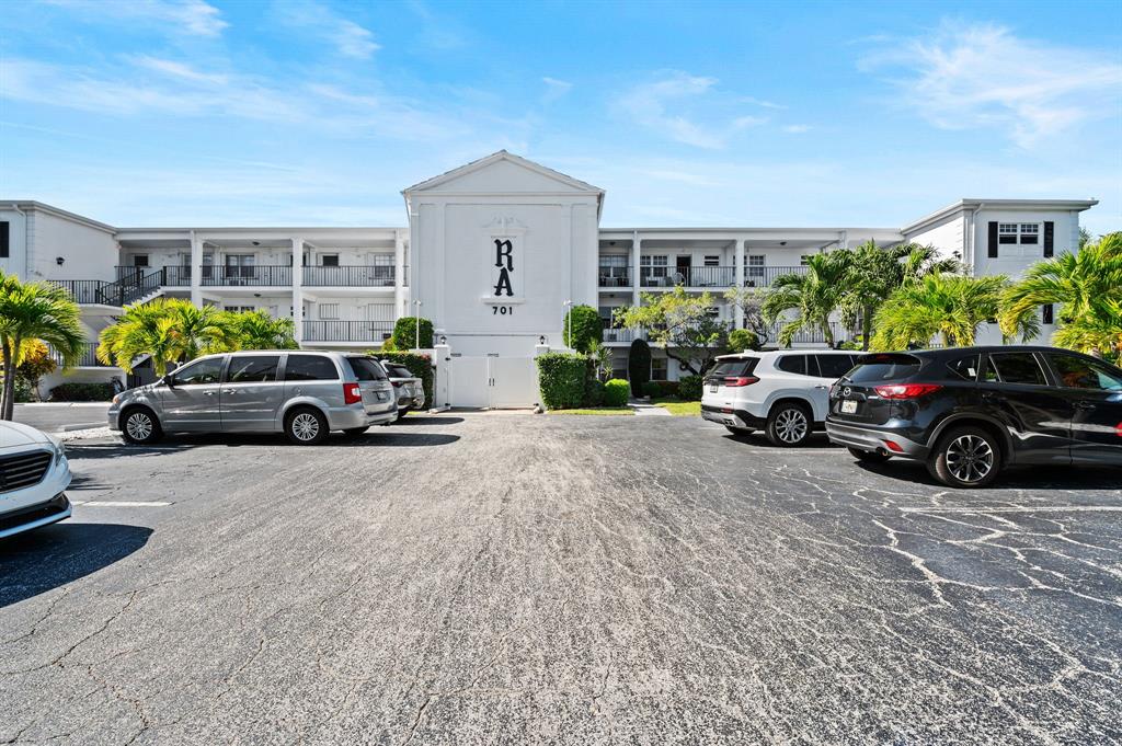 701 South Riverside Drive, Unit 107 Pompano Beach, FL 33062 - Photo 3 of 27 a view of a cars park in front of a building