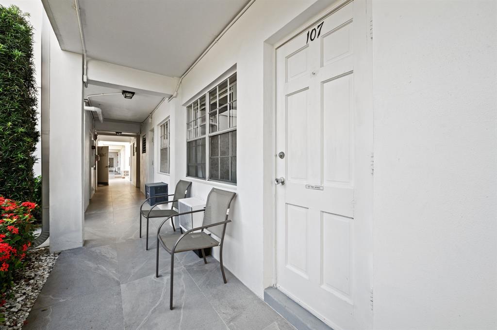 701 South Riverside Drive, Unit 107 Pompano Beach, FL 33062 - Photo 4 of 27 a view of a hallway with workspace and a hallway