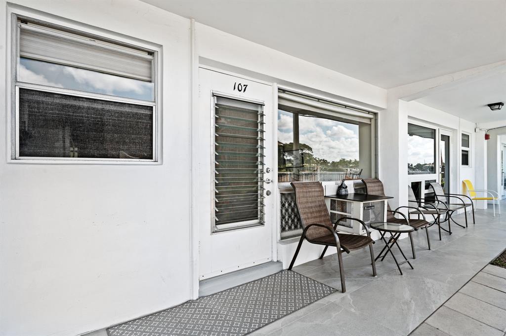 701 South Riverside Drive, Unit 107 Pompano Beach, FL 33062 - Photo 5 of 27 a dining room with furniture and window