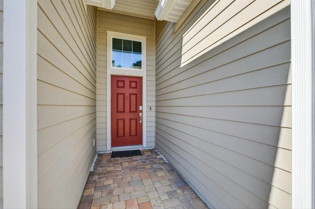 210 White Rabbit Run St. Augustine, FL 32092 - Photo 56 of 85 a view of front door of a house
