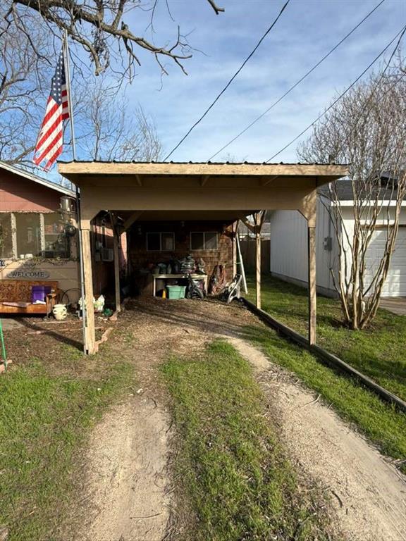 710 Whitney Street Morgan, TX 76671 - Photo 20 of 23 View of shed featuring driveway