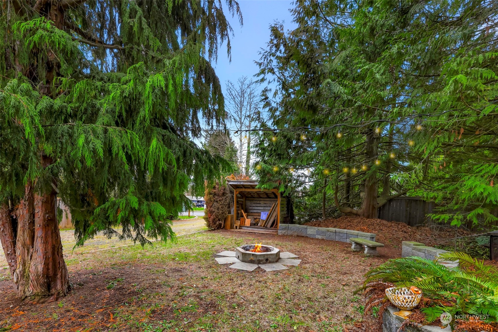 4532 Decatur Drive Ferndale, WA 98248 - Photo 30 of 32 a backyard of a house with table and chairs