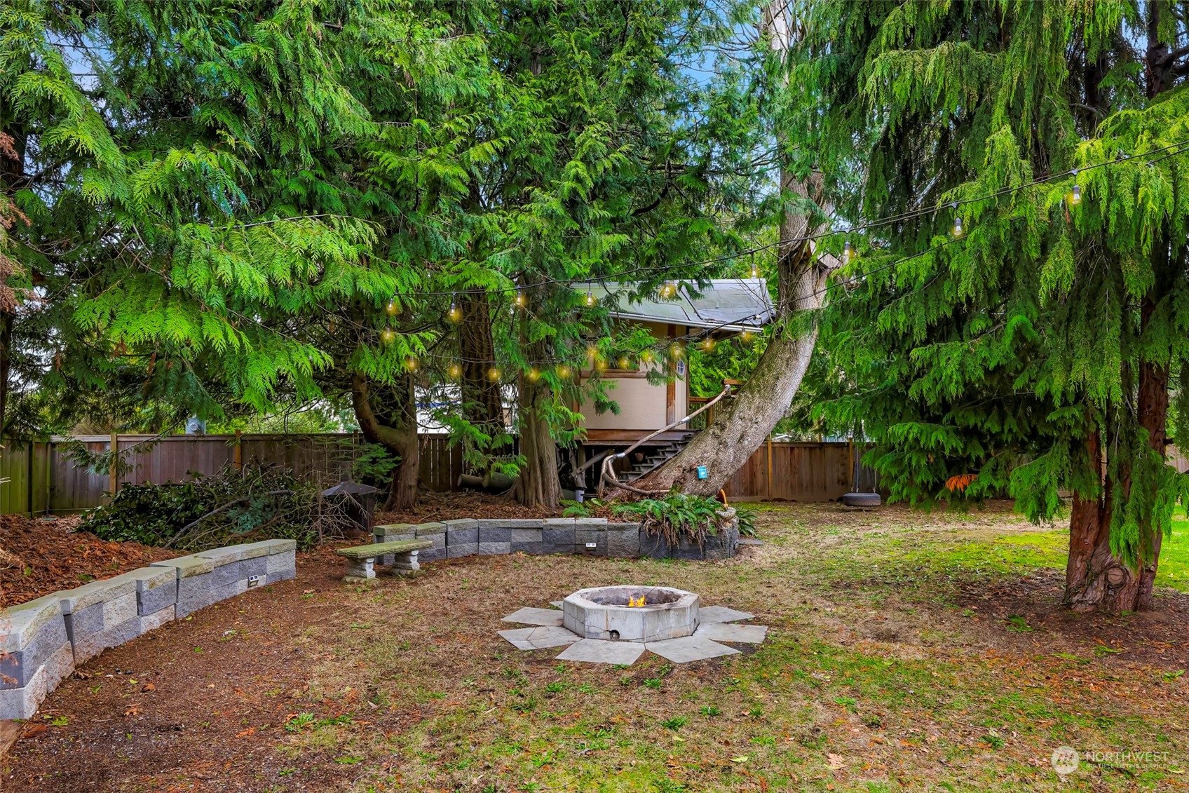 4532 Decatur Drive Ferndale, WA 98248 - Photo 32 of 32 a backyard of a house with barbeque oven table and chairs