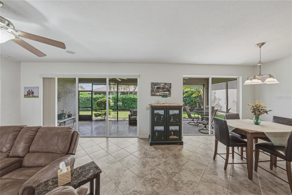 4489 Strathmore Drive Lake Wales, FL 33859 - Photo 13 of 89 a living room with furniture and a fireplace