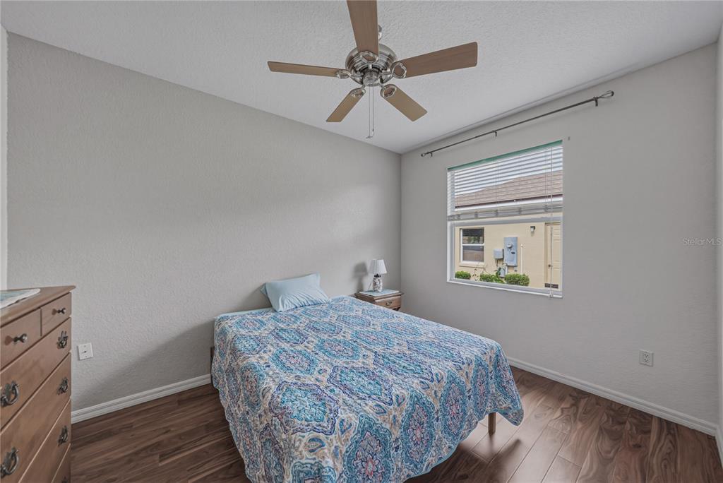 4489 Strathmore Drive Lake Wales, FL 33859 - Photo 37 of 89 a bedroom with a bed and a window