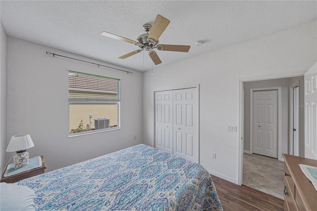 4489 Strathmore Drive Lake Wales, FL 33859 - Photo 38 of 89 a bedroom with a bed and a window