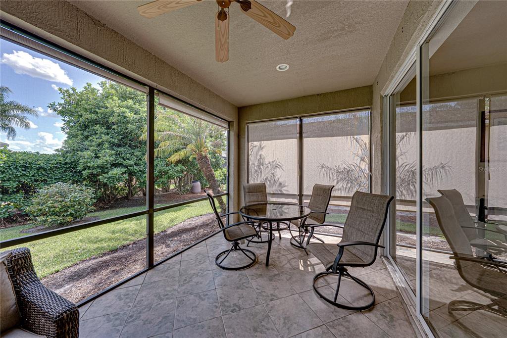 4489 Strathmore Drive Lake Wales, FL 33859 - Photo 44 of 89 a view of a patio with chairs and table in patio