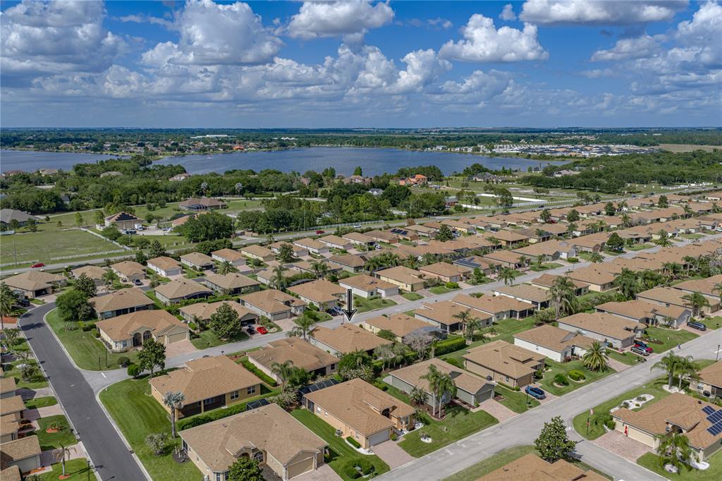 4489 Strathmore Drive Lake Wales, FL 33859 - Photo 64 of 89 an aerial view of residential building with outdoor space