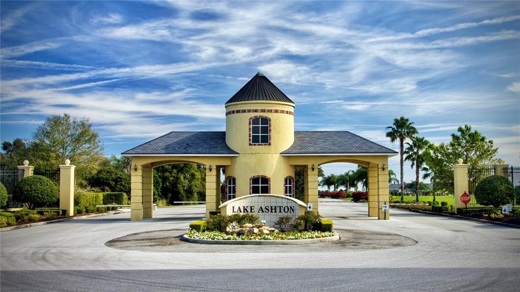 4489 Strathmore Drive Lake Wales, FL 33859 - Photo 69 of 89 a front view of a house with garden