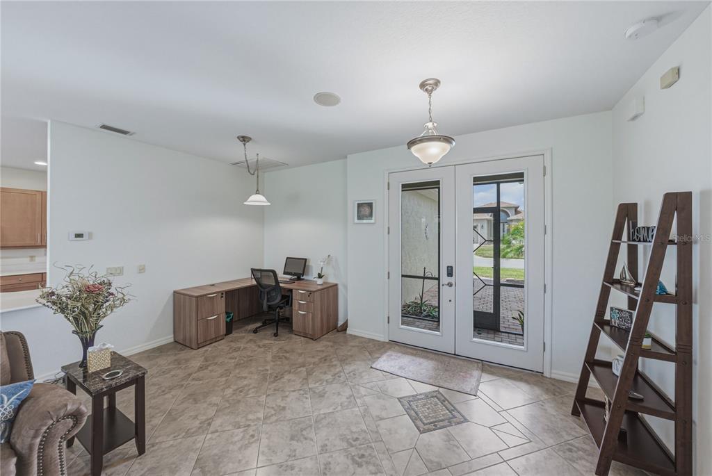 4489 Strathmore Drive Lake Wales, FL 33859 - Photo 7 of 89 a view of a livingroom with furniture and a chandelier