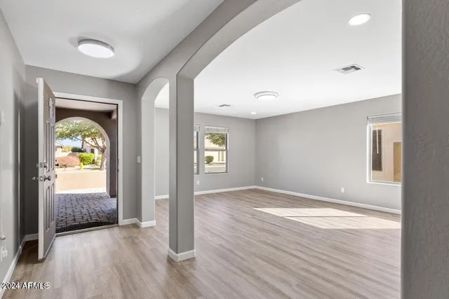a view of an empty room and window