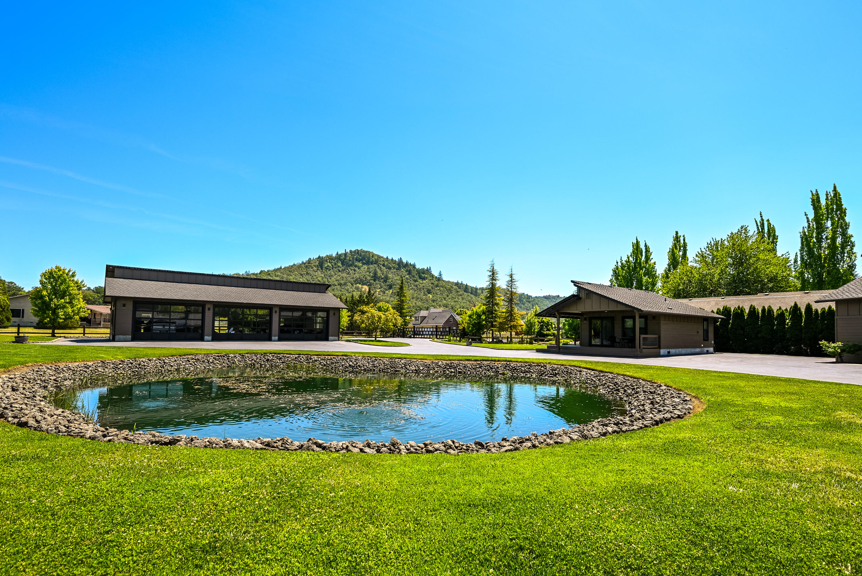 2546 Fisher Road Roseburg, OR 97471 - Photo 54 of 59 a view of house with swimming pool and yard