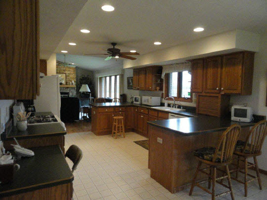 5505 Freeport Road Rockton, IL 61072 - Photo 5 of 11 a kitchen with kitchen island granite countertop lots of counter top space