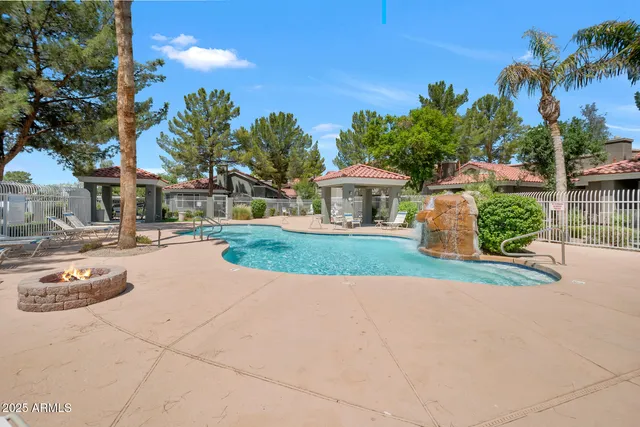 a view of a street with houses on both side