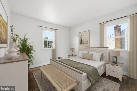 a view of a livingroom with furniture and a fireplace