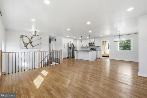 a view of a hallway with windows
