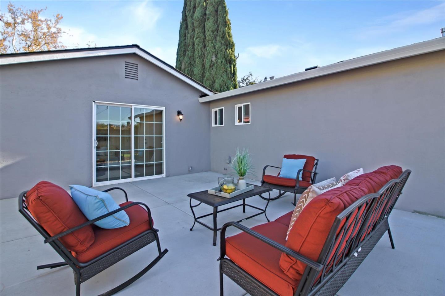 696 Coyote Road San Jose, CA 95111 - Photo 24 of 47 a backyard of a house with seating space