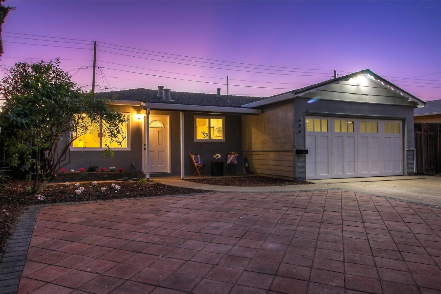 696 Coyote Road San Jose, CA 95111 - Photo 27 of 47 a view of a house with a small yard and a large parking space