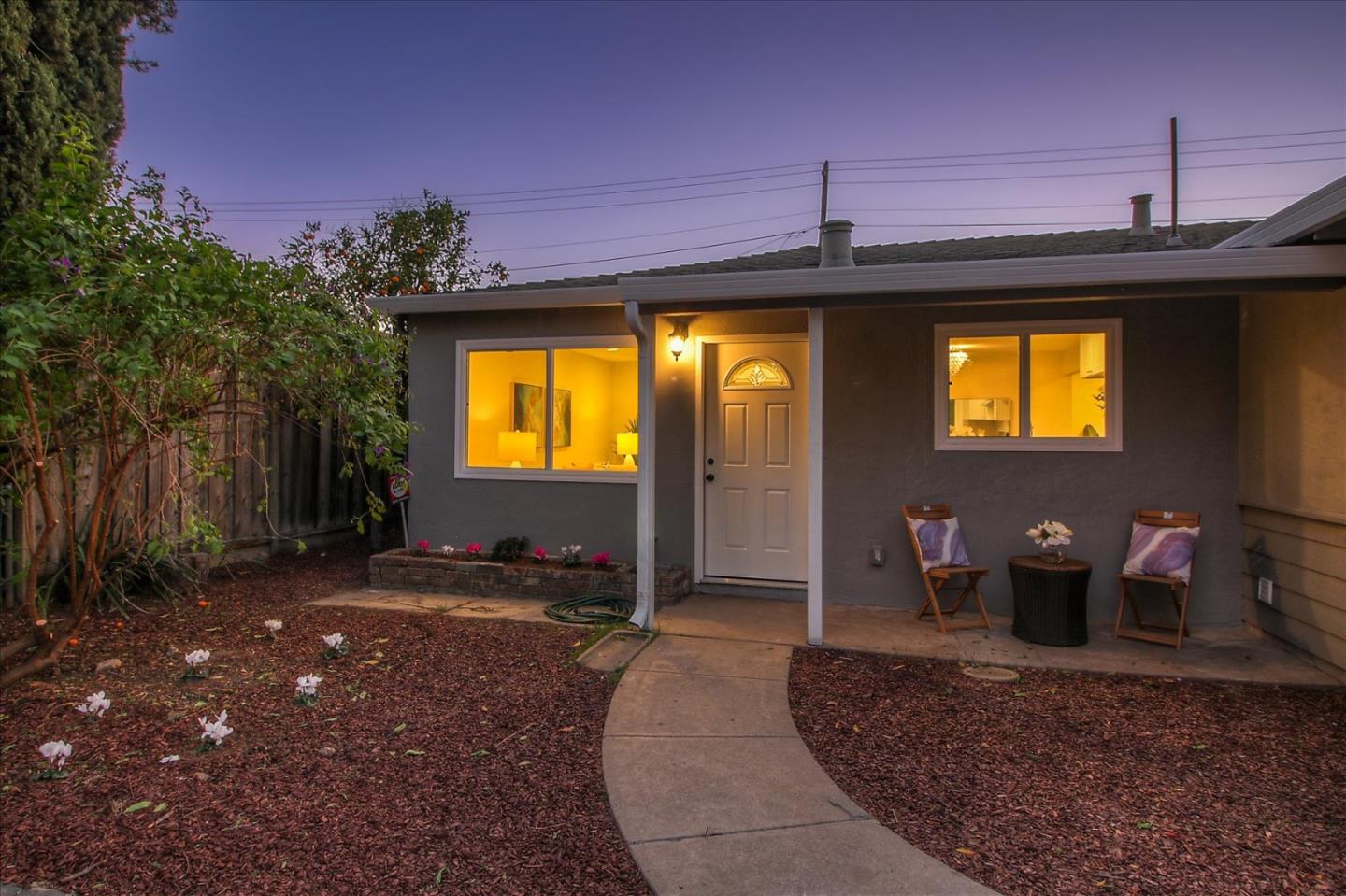 696 Coyote Road San Jose, CA 95111 - Photo 29 of 47 a front view of a house with a yard