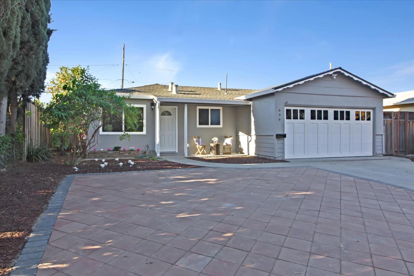 696 Coyote Road San Jose, CA 95111 - Photo 3 of 47 a view of a house with a yard and potted plants