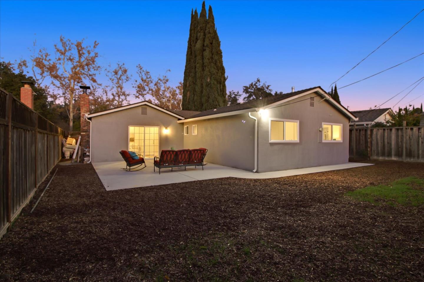 696 Coyote Road San Jose, CA 95111 - Photo 32 of 47 a front view of a house with a yard