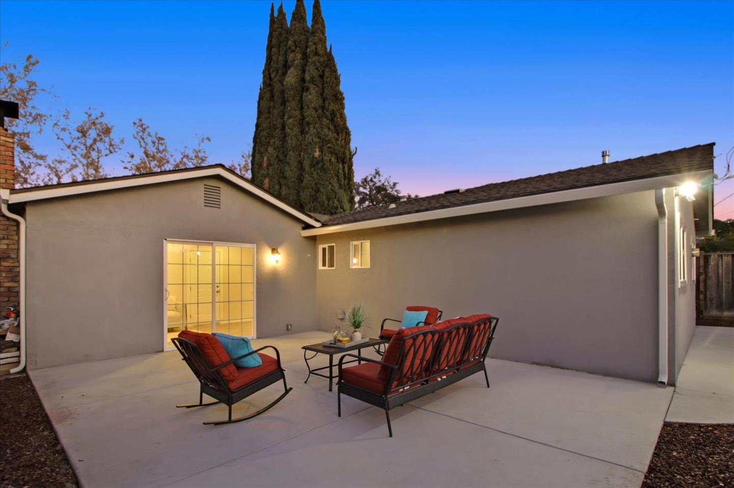 696 Coyote Road San Jose, CA 95111 - Photo 36 of 47 a backyard of a house with outdoor seating