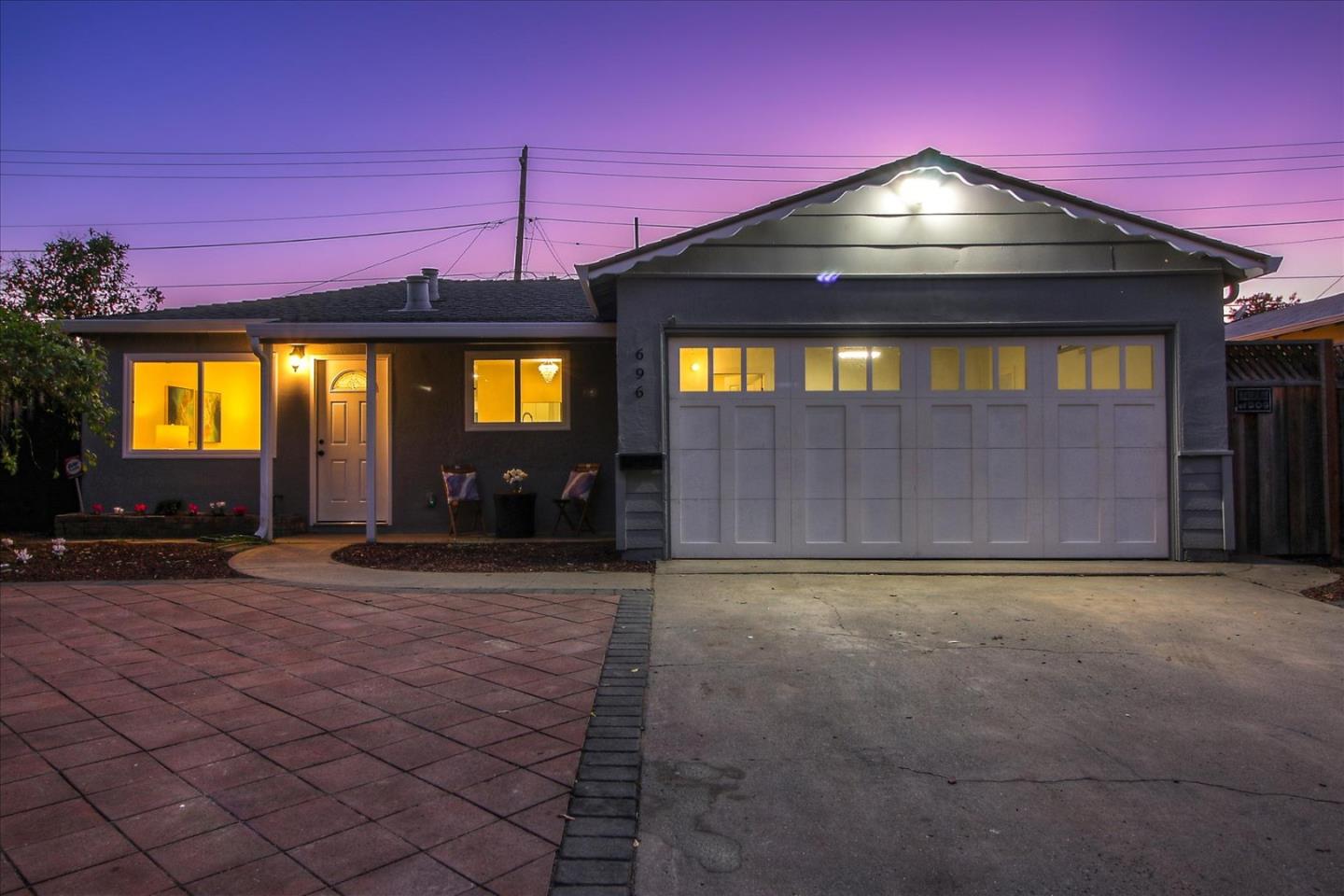 696 Coyote Road San Jose, CA 95111 - Photo 38 of 47 a view of an empty room with a fireplace and a window