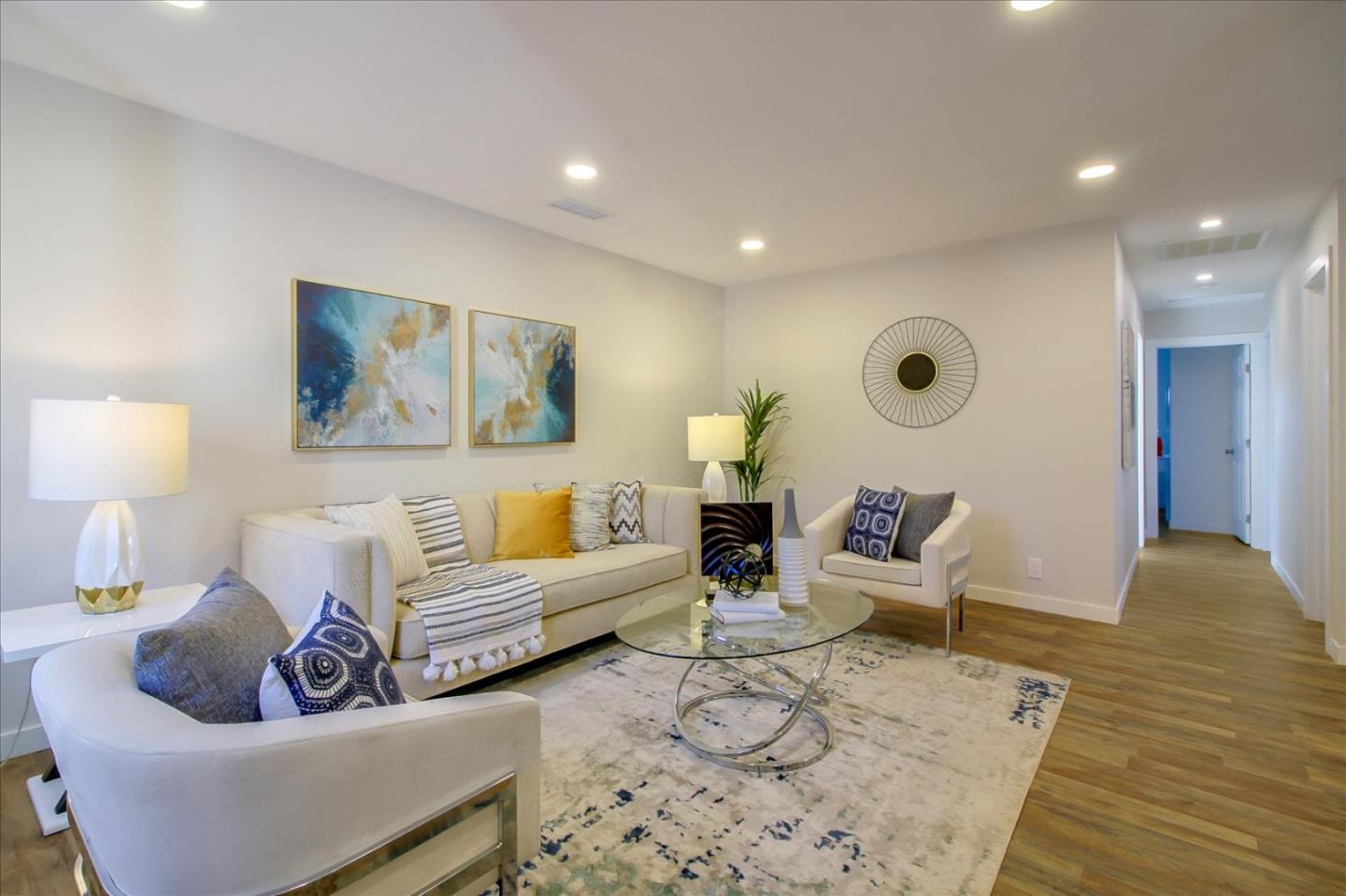 696 Coyote Road San Jose, CA 95111 - Photo 4 of 47 a living room with furniture and wooden floor