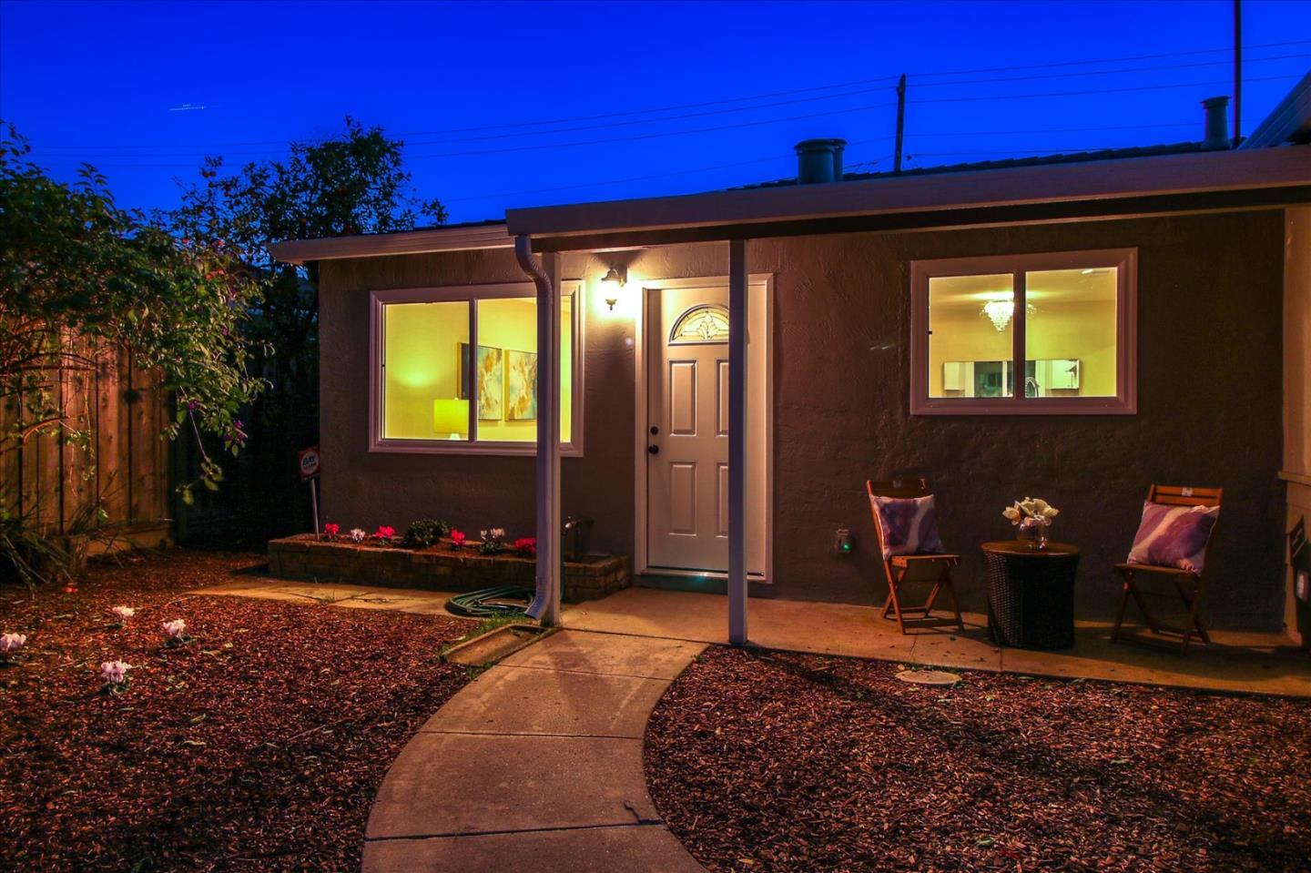696 Coyote Road San Jose, CA 95111 - Photo 44 of 47 a front view of a house with a yard