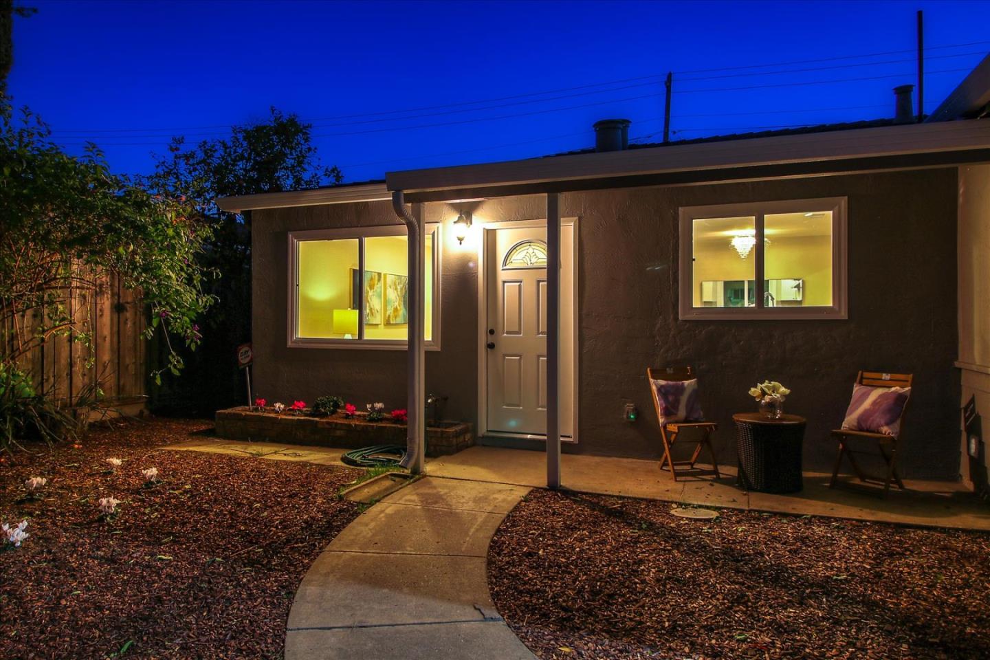 696 Coyote Road San Jose, CA 95111 - Photo 47 of 47 a bedroom with a bed potted plant and a potted plant