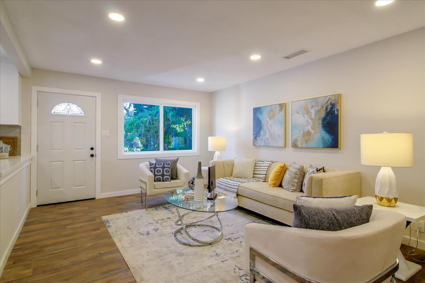 696 Coyote Road San Jose, CA 95111 - Photo 5 of 47 a living room with furniture and a large window