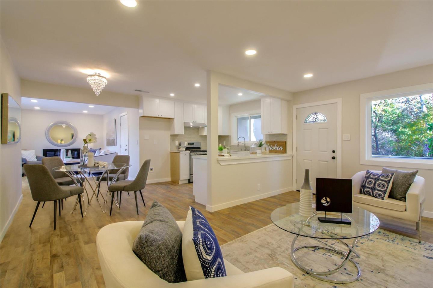 696 Coyote Road San Jose, CA 95111 - Photo 7 of 47 a living room with furniture and kitchen view