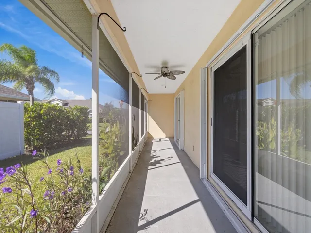 a view of balcony with furniture