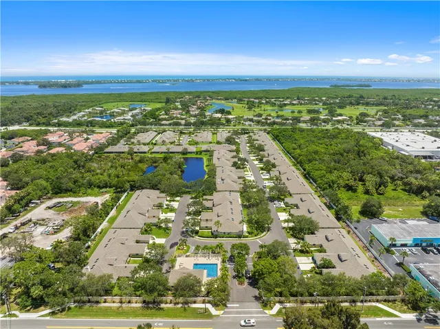 a view of city with ocean