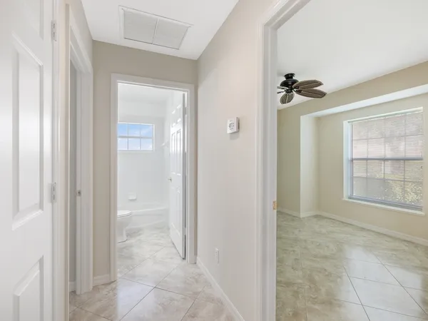 a view of a bathroom with a glass door shower