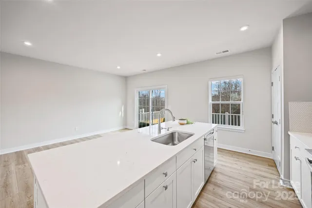 a large white room with a large window