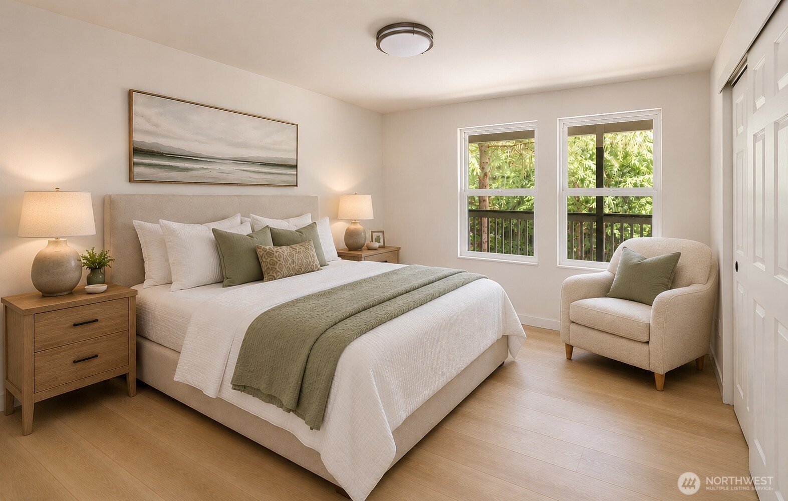 7605 Northeast Hidden Cove Road Bainbridge Island, WA 98110 - Photo 6 of 36 a bedroom with bed and a couch