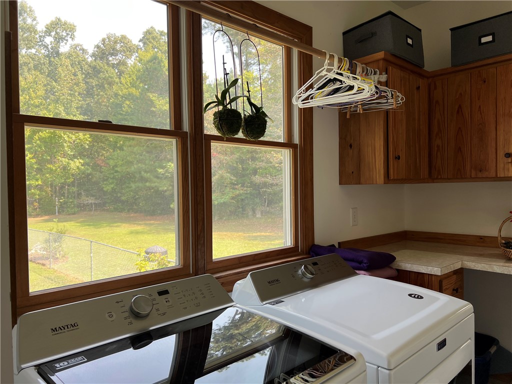 1419 Mill Creek Road Wake, VA 23176 - Photo 43 of 49 Laundry room with cabinet space, washing machine and dryer