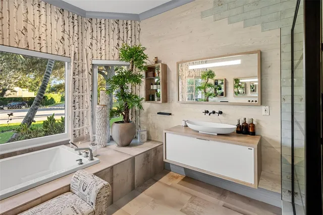 a view of living room with furniture and a large window