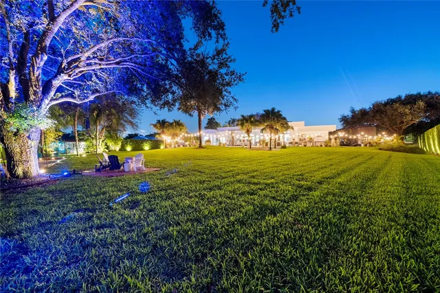 a view of a golf course with a big yard